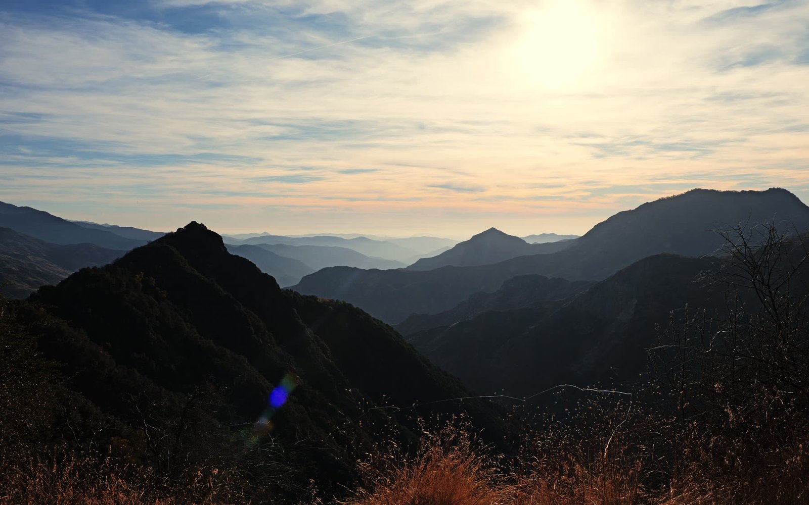 Aerial view of coastal ridgelines at golden hour